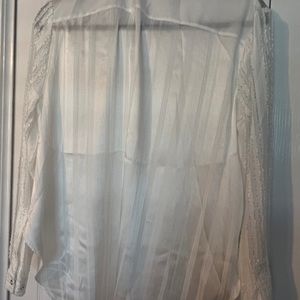 White T Tahari White blouse.  May be worn tuck or as a tunic type.